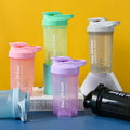 Set of colorful protein shakers on a blue and yellow background