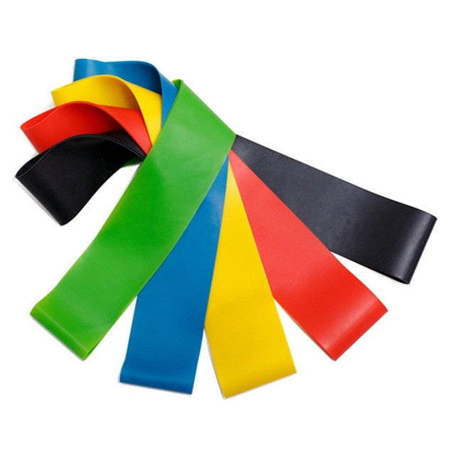 A set of five resistance bands in black, blue, yellow, red, and green, fanned out on a white background.