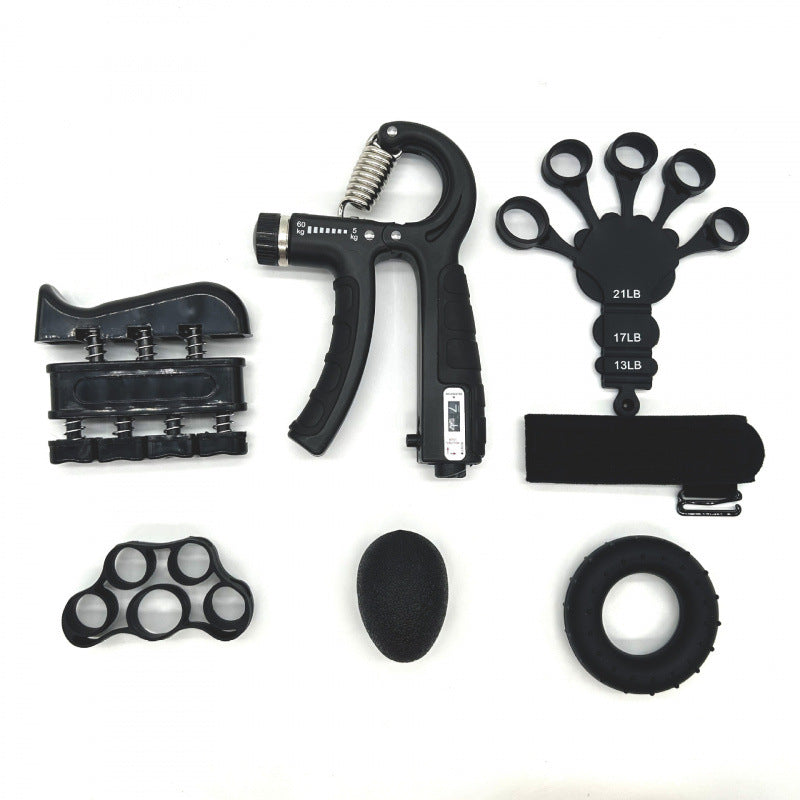 Collection of black hand and finger exercisers on a white background