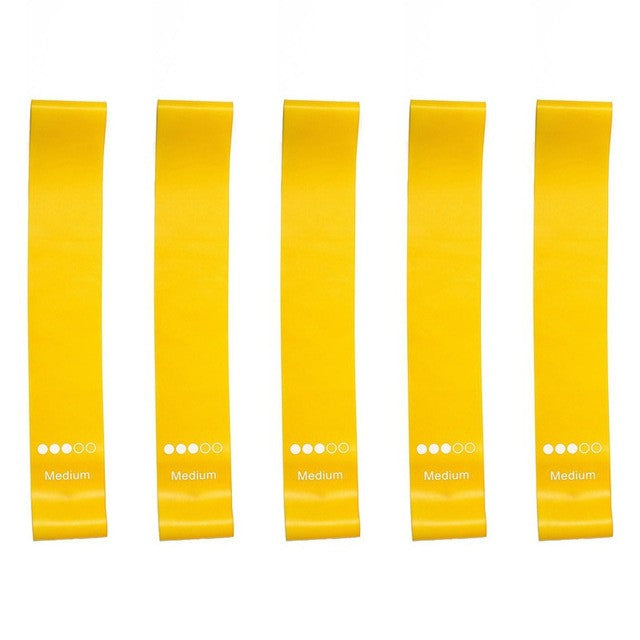 Five yellow resistance bands arranged vertically on a white background, with the text '5 yellow' below them.
