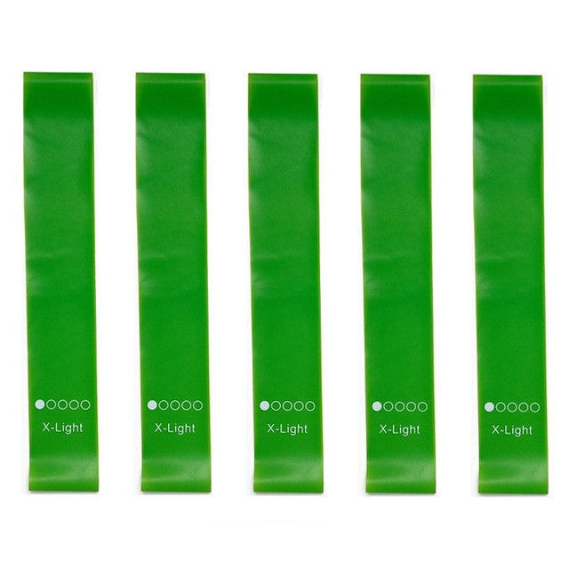 Five green resistance bands arranged vertically on a white background, with '5 green' printed below them. Each band has white printed markings including 'X-Light' and resistance level dots.